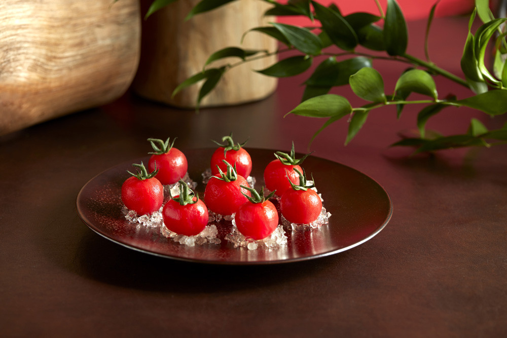 Chilled cherry tomato marinated in plum wine jelly