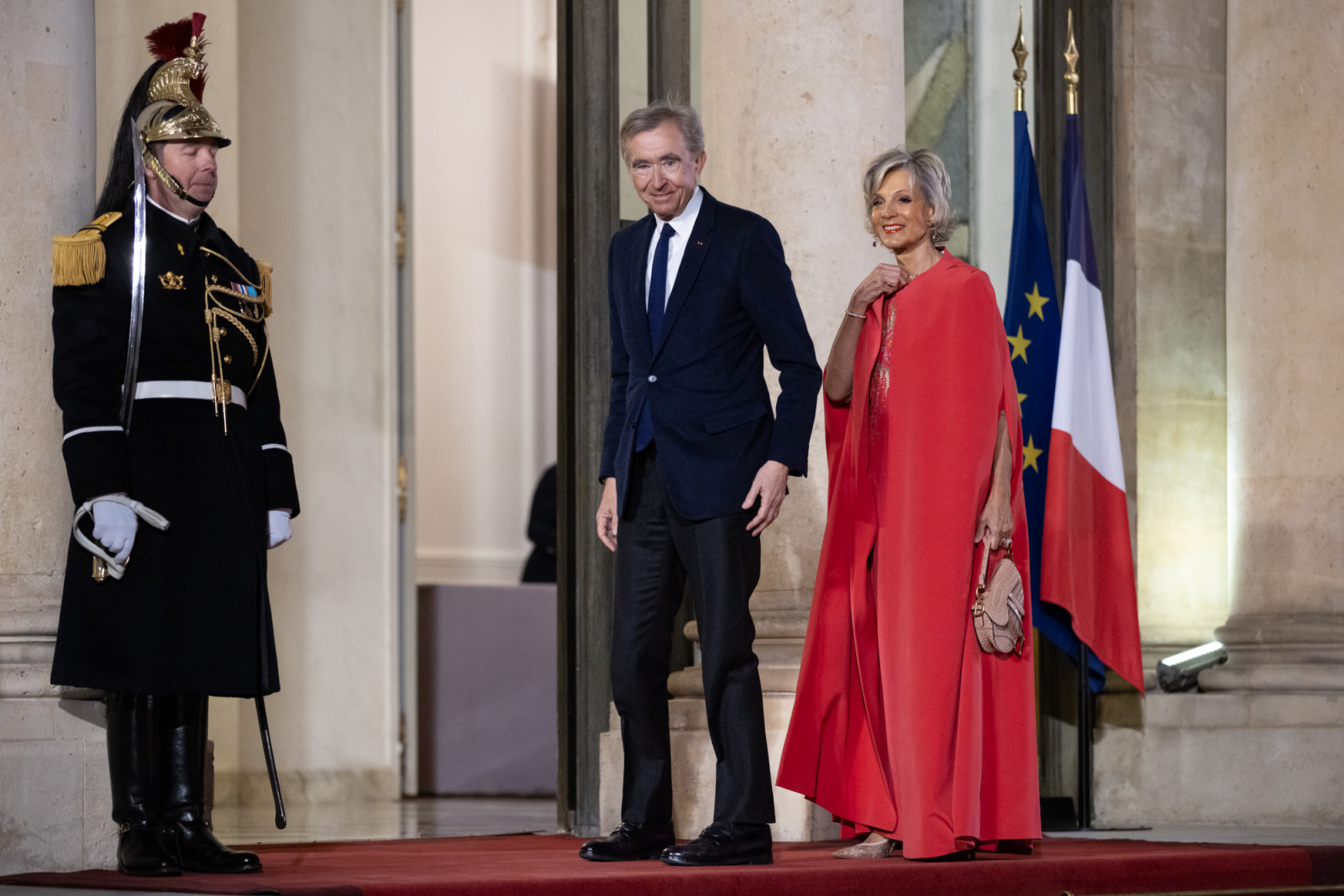 PARIS, FRANCE - MARCH 12: French businessman Bernard Arnault and his wife Helene Mercier-Arnault arrive at the Elysee Palace for a dinner as part of a state visit by President of Uzbekistan Shavkat Mirziyoyev (not pictured) in Paris, France on March 12, 2025. (Photo by Tom Nicholson/Anadolu via Getty Images)
