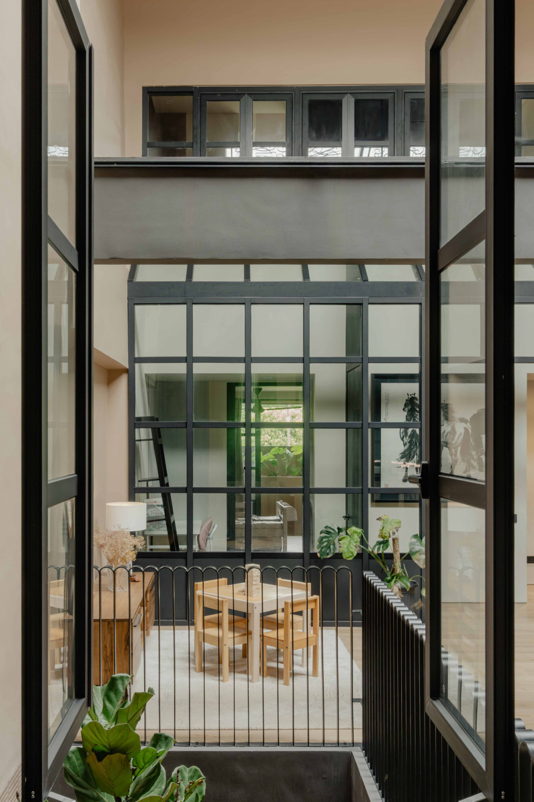 The eldest son’s bedroom on the second storey looks across to his siblings’ wing