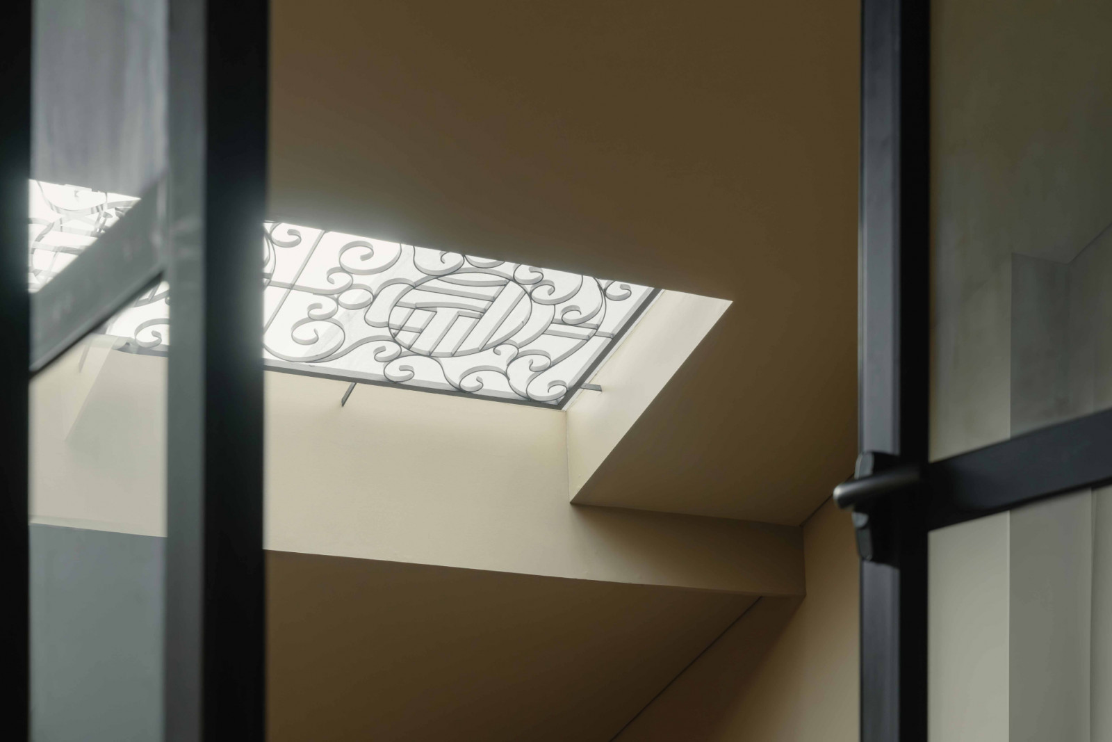 These old metal grilles were repurposed as skylight elements