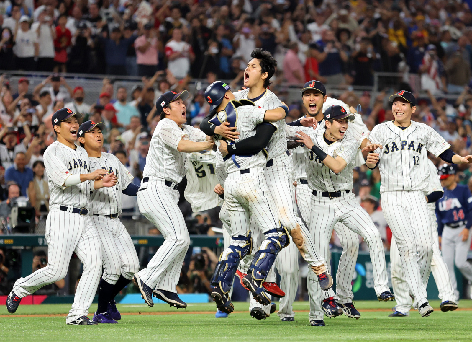 MIAMI, FLORIDA - MARCH 21: Team Japan celebrates after the final out of the World Baseball Classic Championship defeating Team USA 3-2 at loanDepot park on March 21, 2023 in Miami, Florida. (Photo by Megan Briggs/Getty Images)