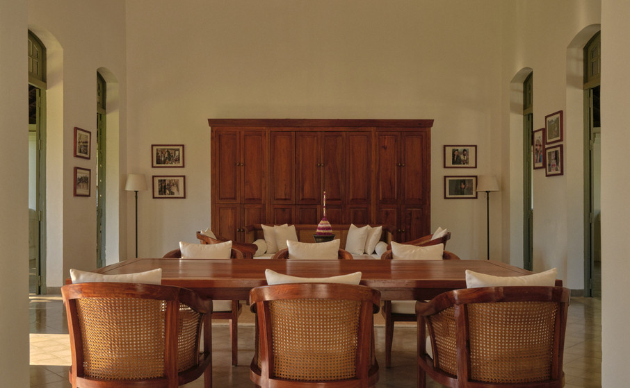An interior room with high ceilings, louvred doors and thick plaster walls, original to the hospital buildings