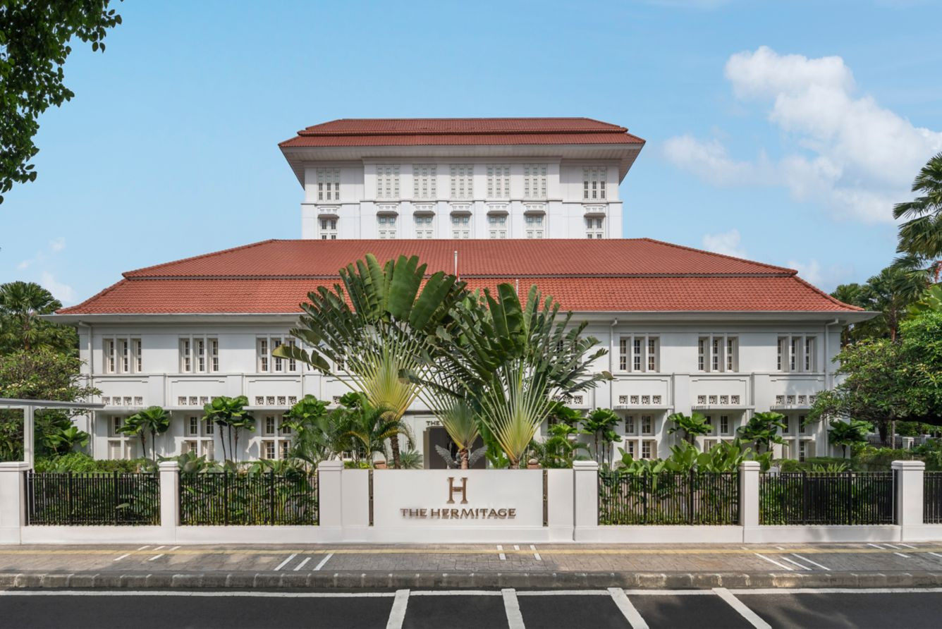 The restoration preserved the original roofline, fenestration pattern and low-slung tropical proportions of the 1923 building.
