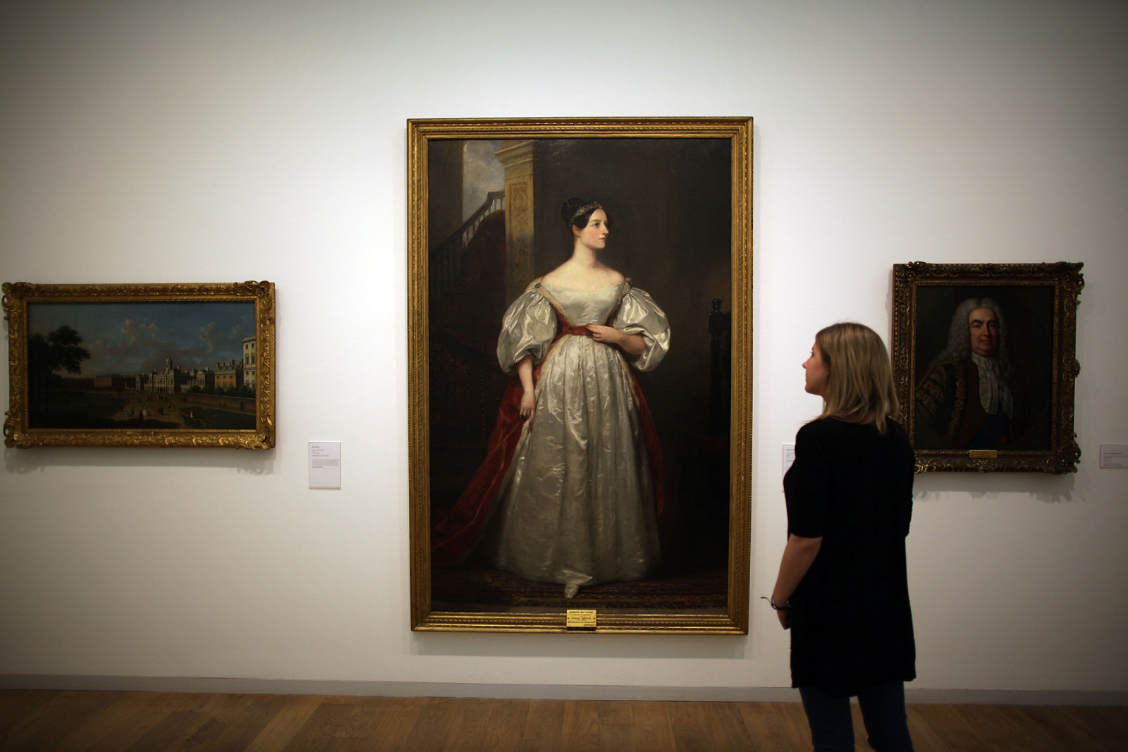 A gallery employee looks at Margaret Carpenter's painting 'Ada Lovelace (1815 -1852) Mathematician; daughter of Lord Byron 1836' at The Whitechapel Gallery exhibition of works from The Government Art Collection on March 9, 2012 in London, England. The exhibition is composed of works chosen by the non-political staff at 10 Downing Street and runs from March 9 - 10 June 2012. (Photo by Peter Macdiarmid/Getty Images)