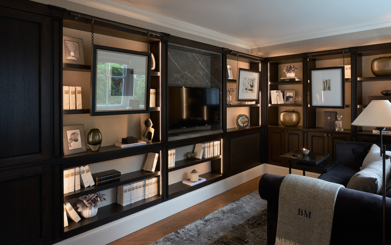 The entertainment room in a renovated Georgian home in London, England designed by Sophie Paterson Interiors