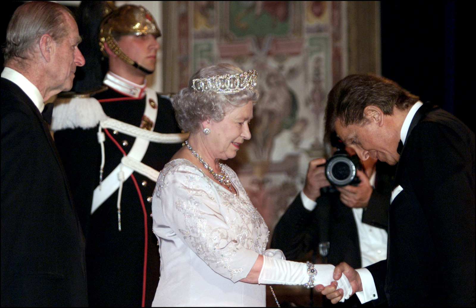 Fashion designer Valentino Garavani meets Britain’s Queen Elizabeth, with Prince Philip, in Rome in 2010. (Photo by Eric Vandeville/Gamma-Rapho via Getty Images)