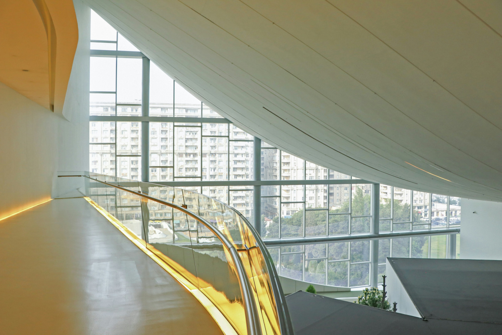 Expansive glazed openings introduce natural light into a series of interconnected spaces (Photo: Unsplash)