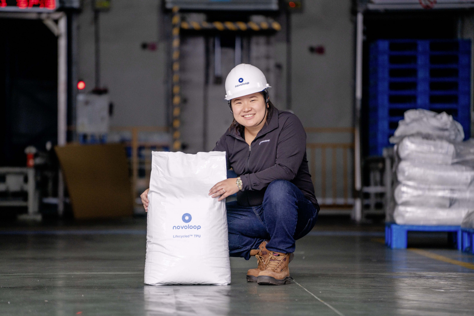Rolex Awards Laureate Miranda Wang pictured with a bag of thermoplastic polyurethane (TPU) at partner company Huafon’s factory in Wenzhou, China. Wang and Novoloop co-founder Jeanny Yao are dedicated to freeing our planet of plastic pollution.
