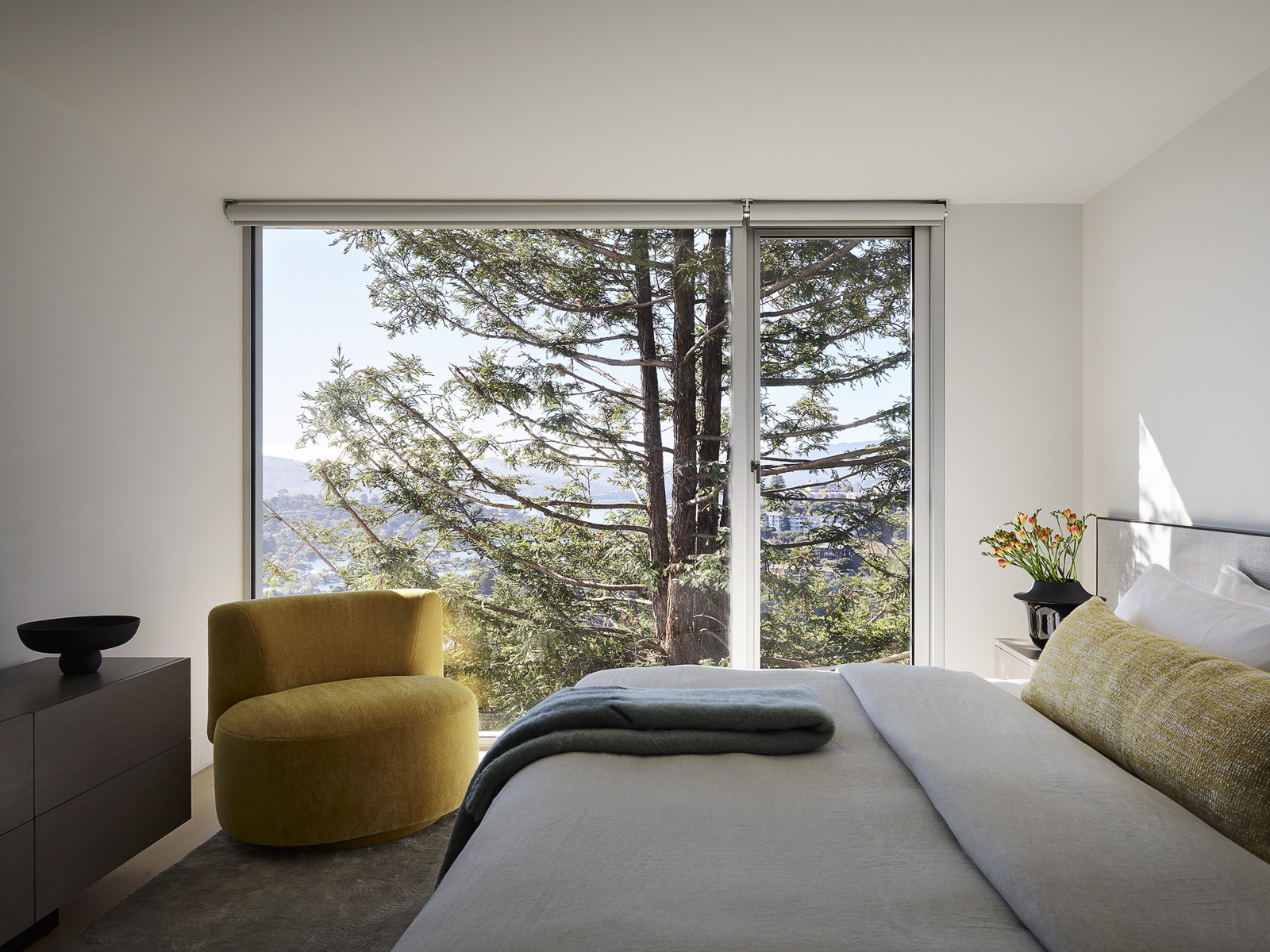 Exploring the modernist details of the bedroom in a San Francisco home designed by Swatt + Partners