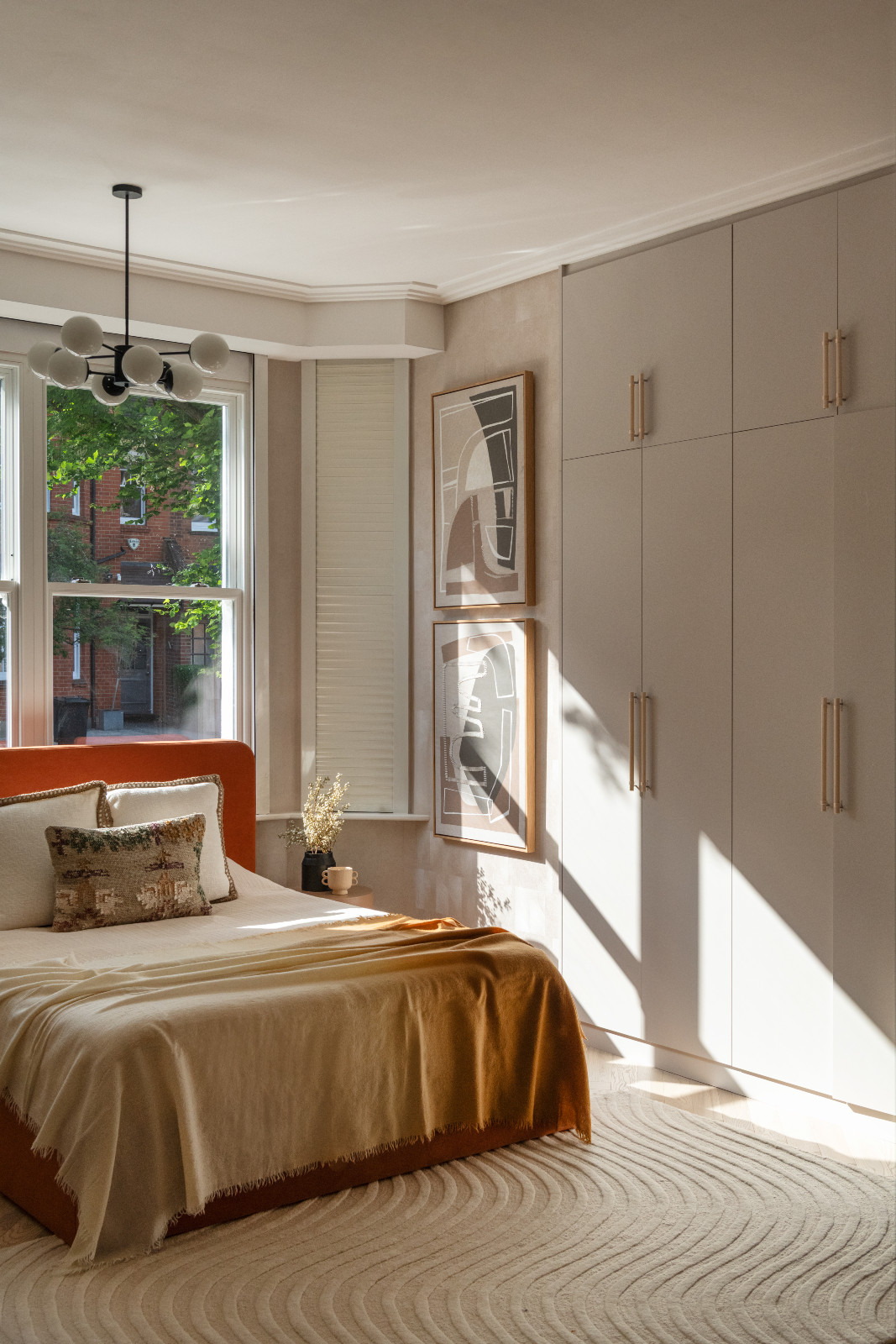 Exploring the sculptural details on display in the bedroom of a London, England home designed by Aashni Kumar