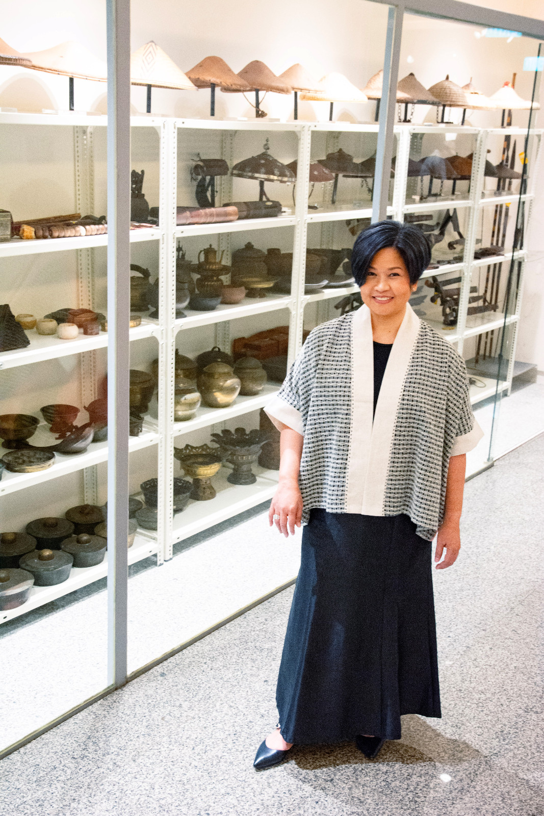 Aprille Tijam at the Visible Storage of Ayala Museum, a space that offers public access and insight into the museum’s collection supporting research and stewardship (Photo: Rex Reynaldo Cabugon)