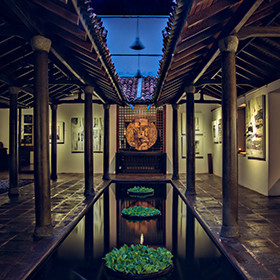 The internal courtyard with lily-pad pond at Paradise Road The Gallery Café, one of three interlocking outdoor and semi-outdoor spaces in Bawa’s original 1961 design