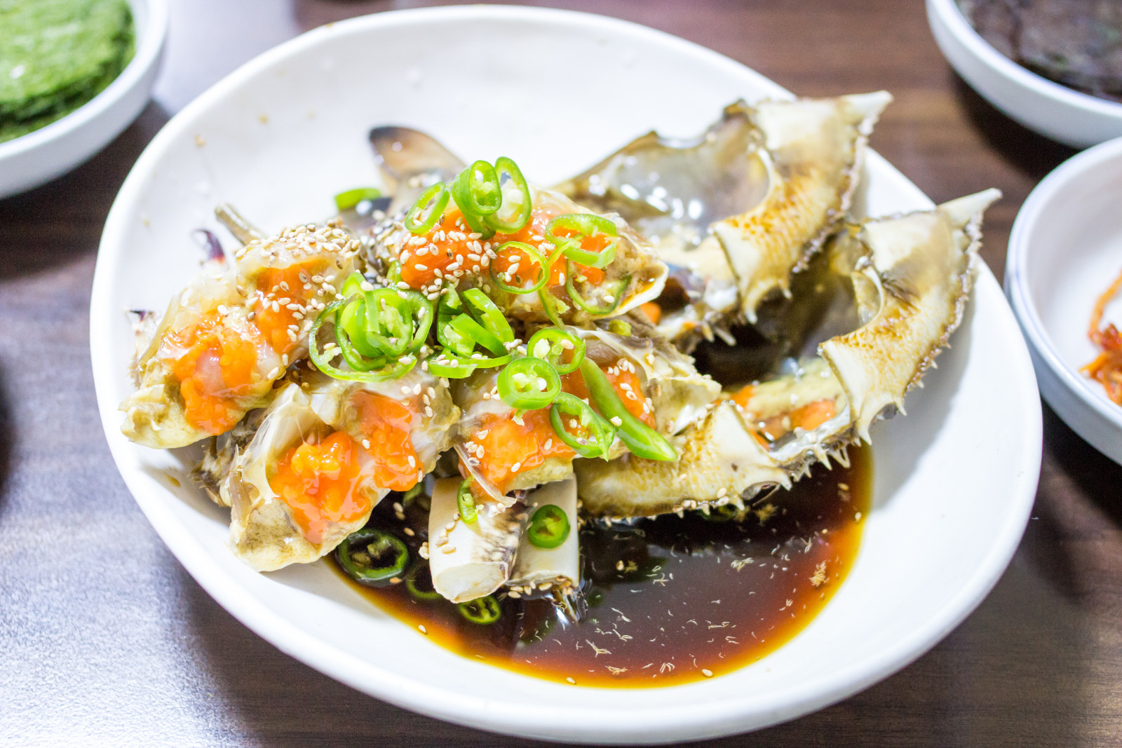 From bustling markets to street corners, Busan serves up a mix of sweet, savoury and seafood dishes that define the city’s culinary identity (Photo: Melissa Tse/Getty Images)