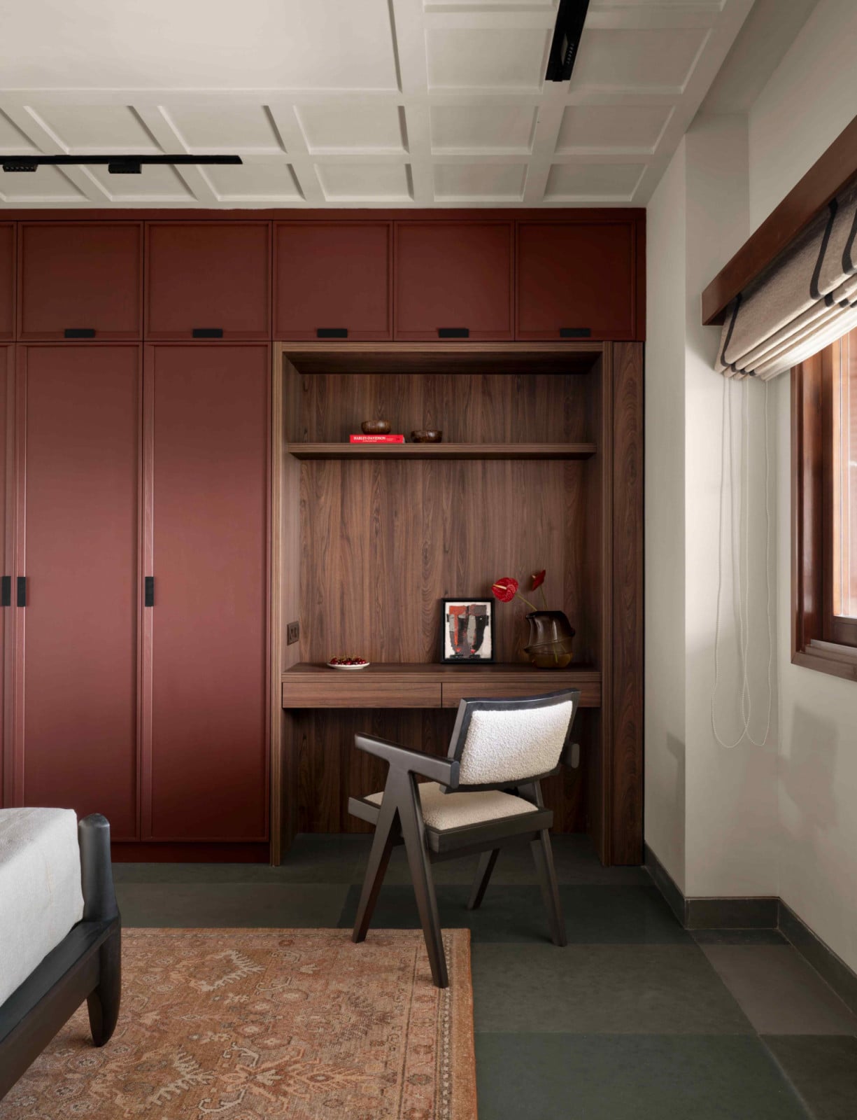 Burgundy-veneered wardrobes inject energy