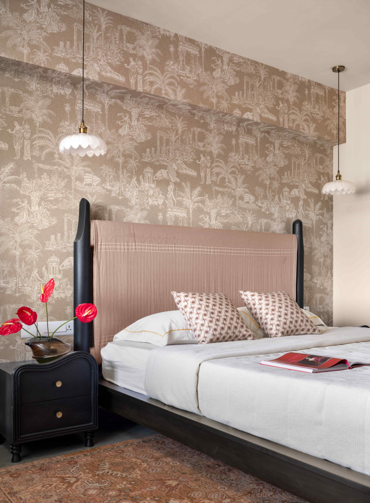 The pictorial wall tapestry in the guest bedroom