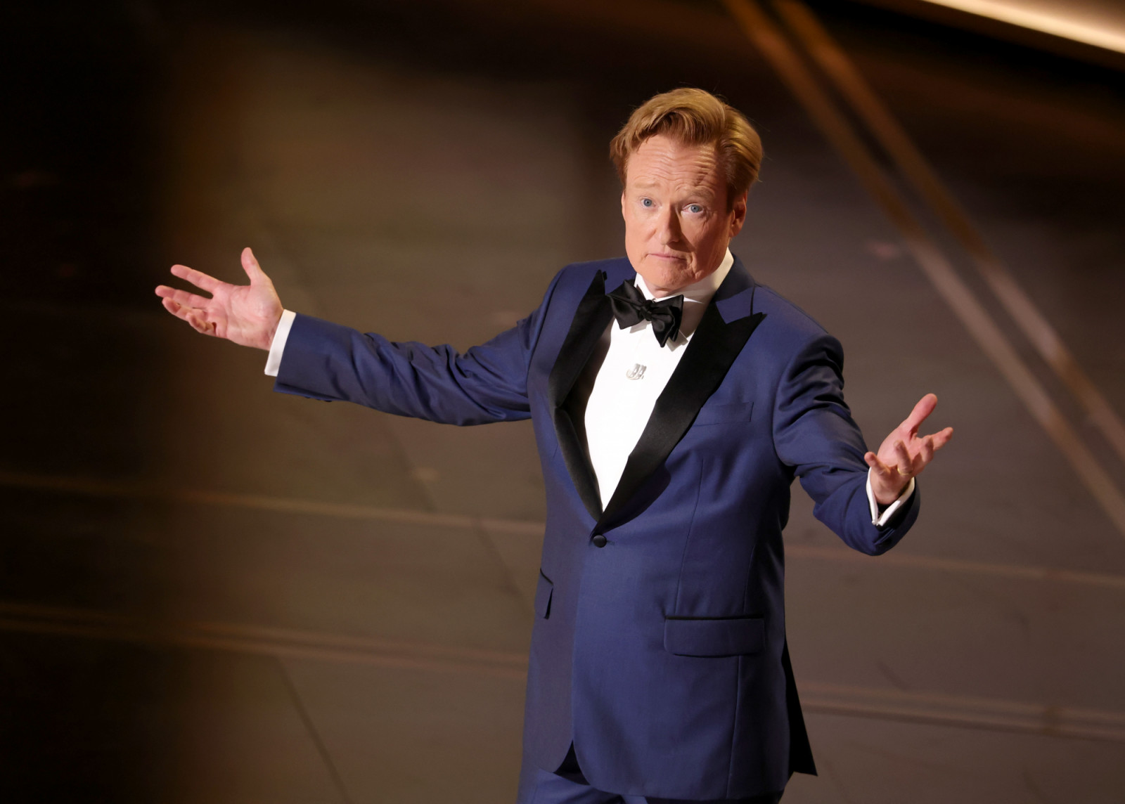 HOLLYWOOD, CALIFORNIA - MARCH 15: Host Conan O'Brien speaks onstage during the 98th Oscars at Dolby Theatre on March 15, 2026 in Hollywood, California. (Photo by Kevin Winter/Getty Images)