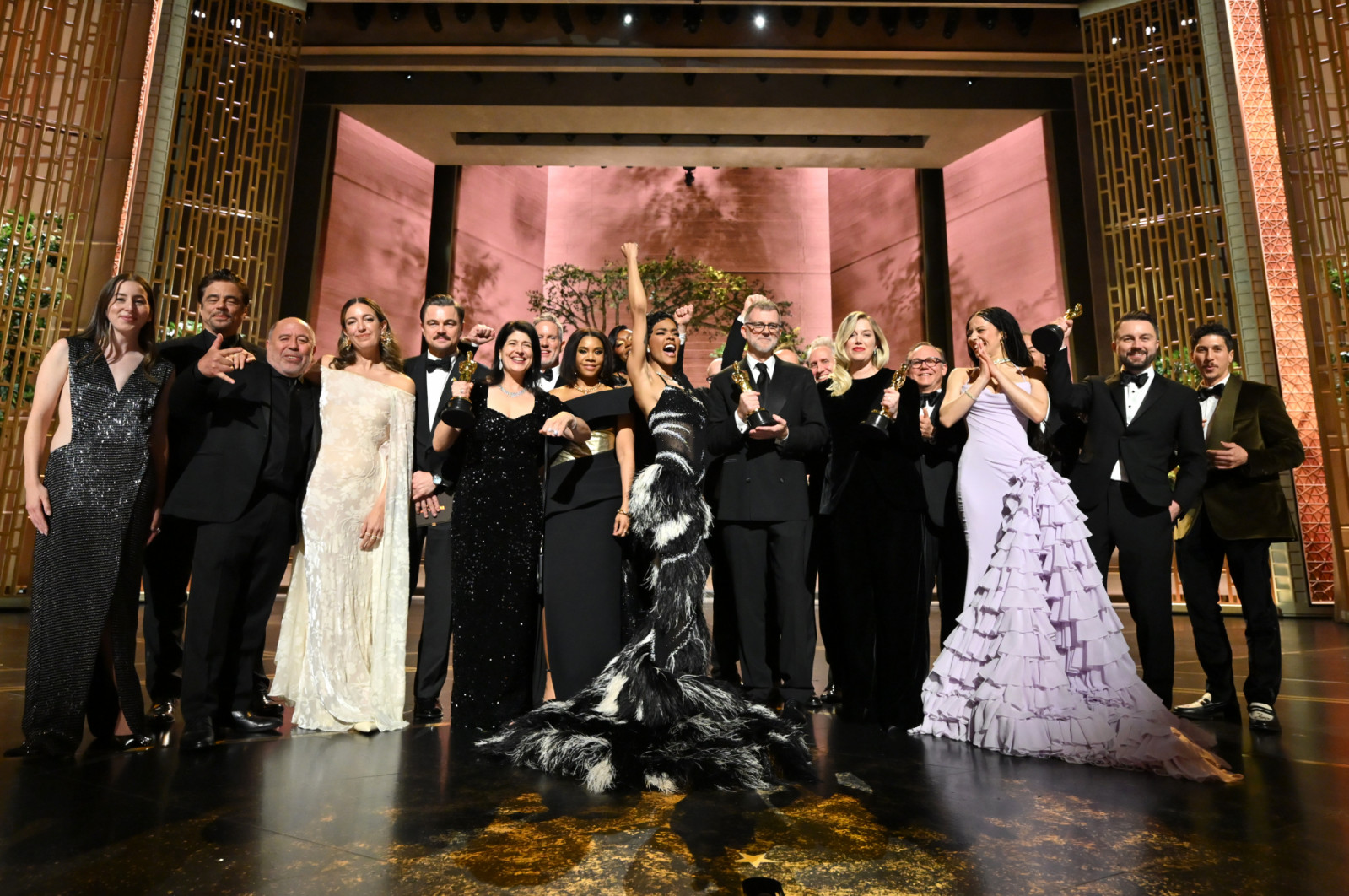 HOLLYWOOD, CALIFORNIA - MARCH 15: In this handout photo provided by The Academy, the cast and crew of Best Picture winner "One Battle After Another" pose during the 98th Oscars at Dolby Theatre on March 15, 2026 in Hollywood, California. (Photo by Richard Harbaugh / The Academy via Getty Images)