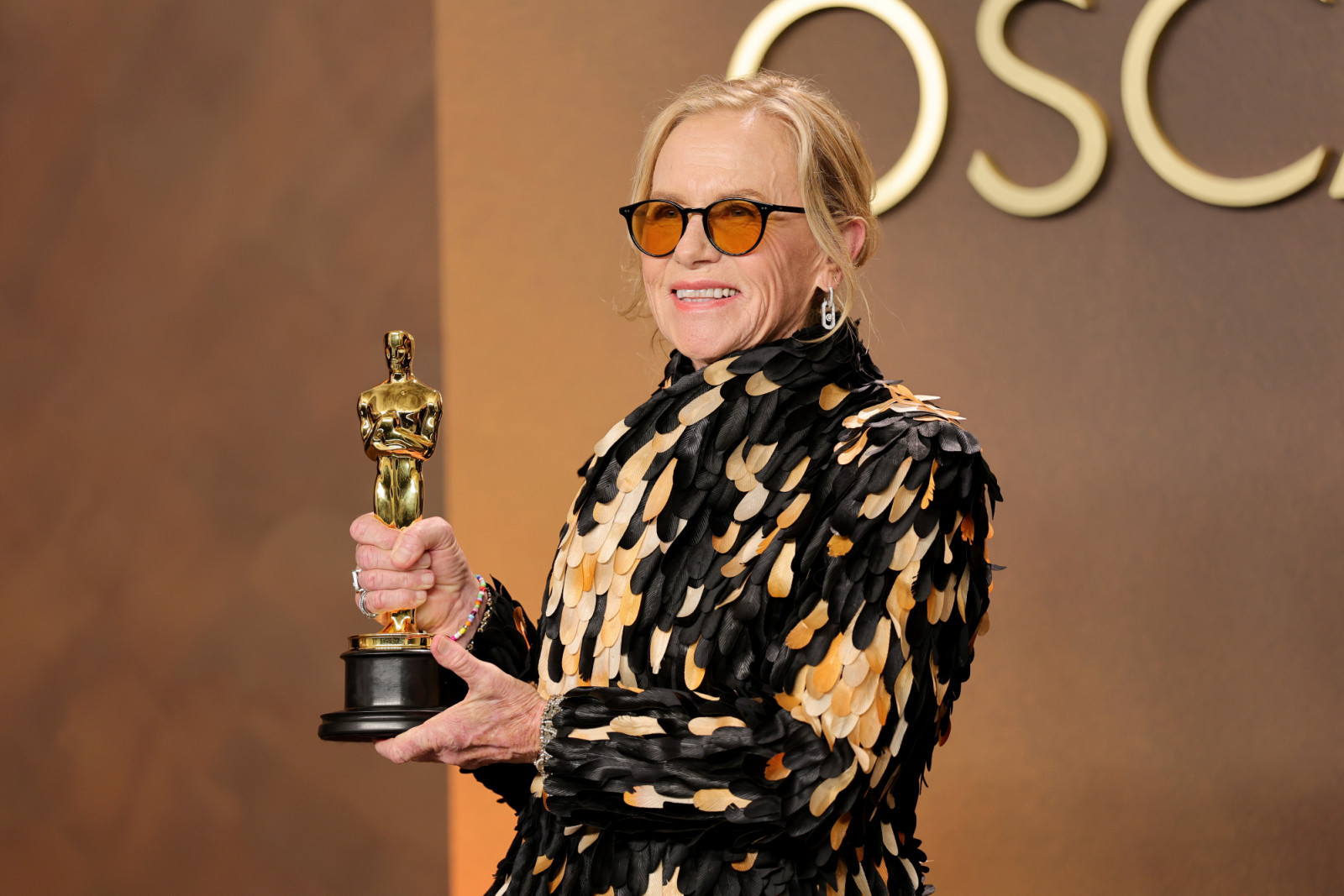 HOLLYWOOD, CALIFORNIA - MARCH 15: Amy Madigan, winner of the Best Actress in a Supporting Role award for “Weapons”, poses in the press room during the 98th Oscars at Dolby Theatre on March 15, 2026 in Hollywood, California. (Photo by Brianna Bryson/Getty Images)