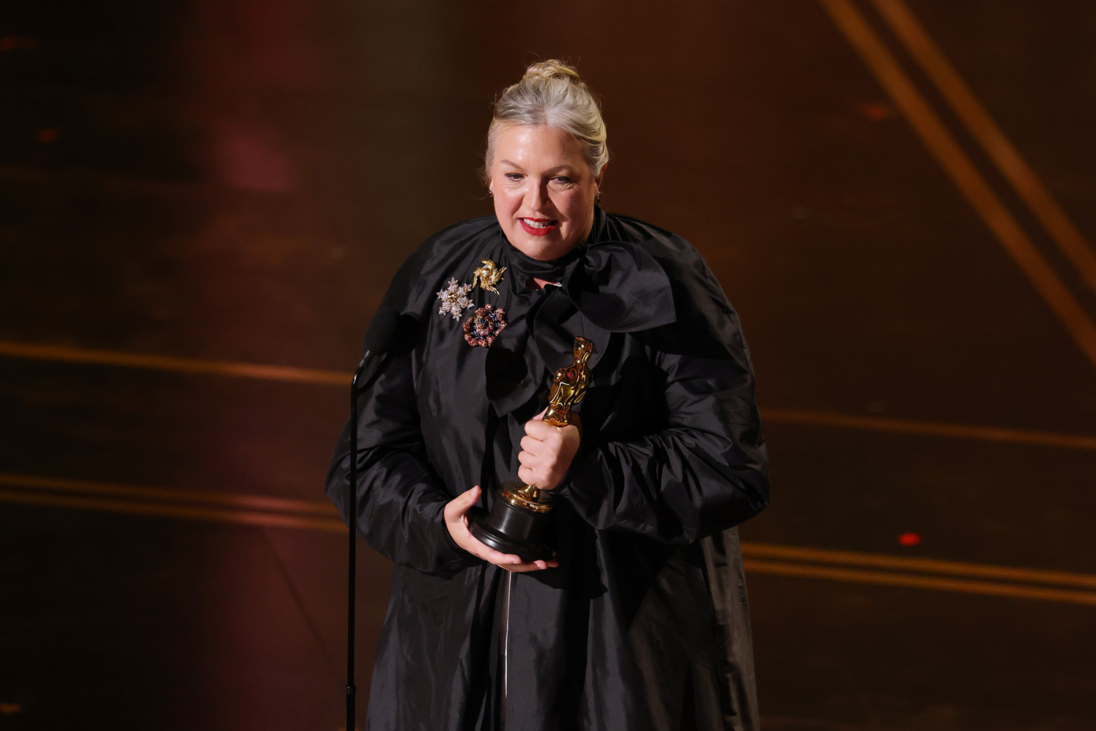 HOLLYWOOD, CALIFORNIA - MARCH 15: Kate Hawley accepts the Costume Design award for "Frankenstein" onstage during the 98th Oscars at Dolby Theatre on March 15, 2026 in Hollywood, California. (Photo by Kevin Winter/Getty Images)