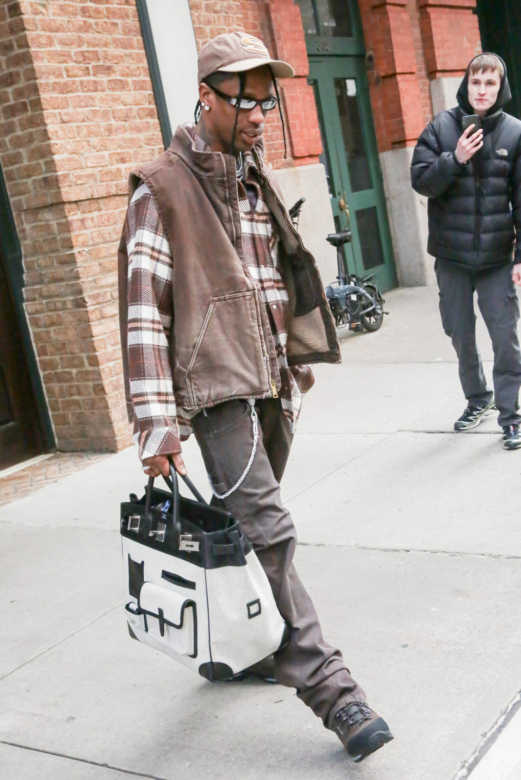 NEW YORK, NY - DECEMBER 19: Travis Scott is seen on December 19, 2023 in New York City. (Photo by Ignat/Bauer-Griffin/GC Images)