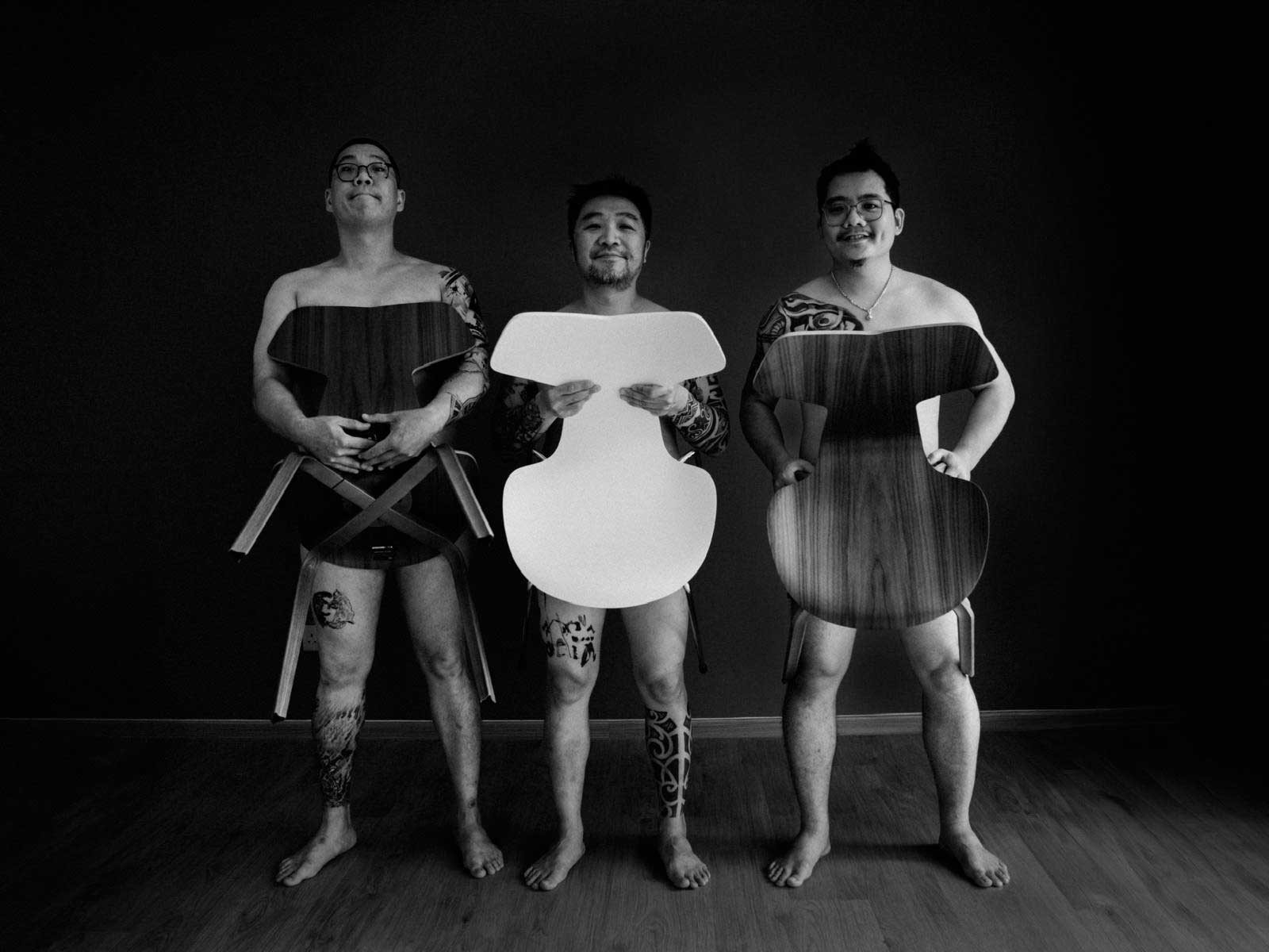 Revolution founders Ian Lim (left) and Alvin Gho (centre) with executive chef Sunny Leong (right) playfully recreating Fritz Hansen’s iconic shoot from the ‘50s