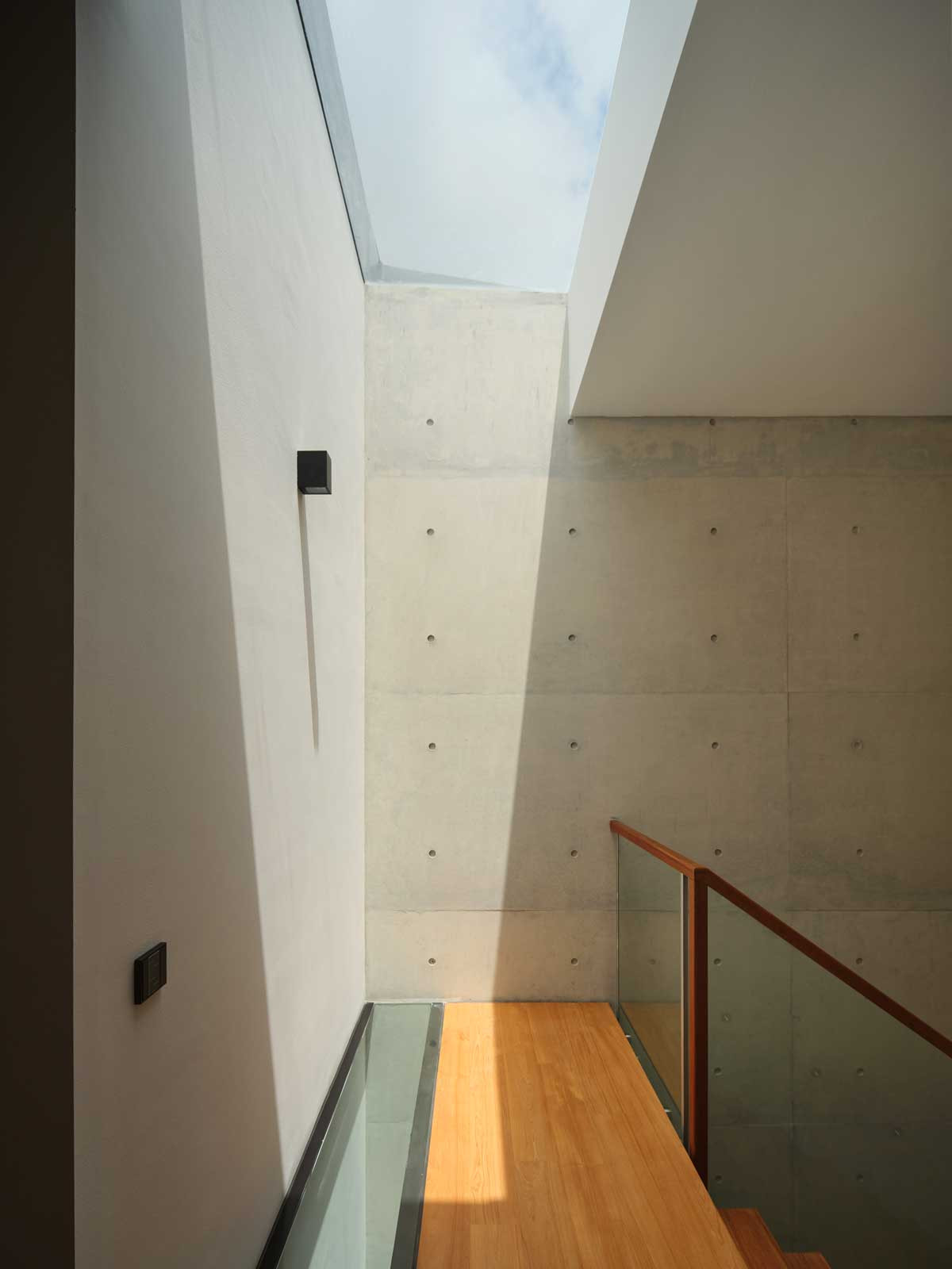 Sunlight streaming in through one of the home’s many strategic architectural openings