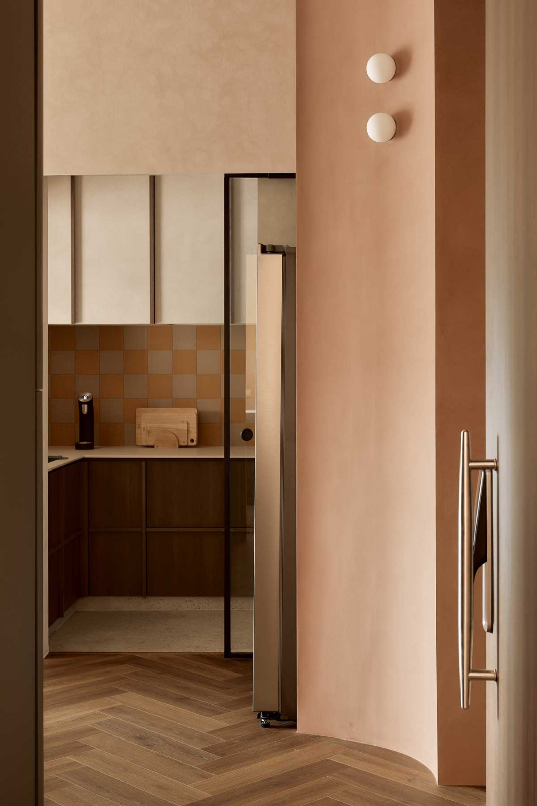 Walls throughout the home are finished in lime wash, creating a soft, mineral texture