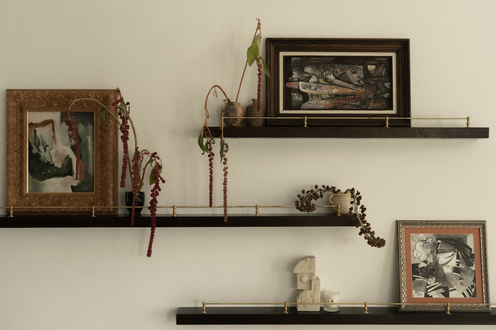 Art on display in the living room of a Dubai family home designed by Amna Chaudry Interiors