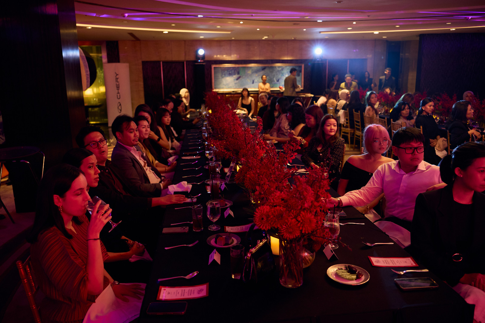Quiet concentration throughout the venue during the fireside chat