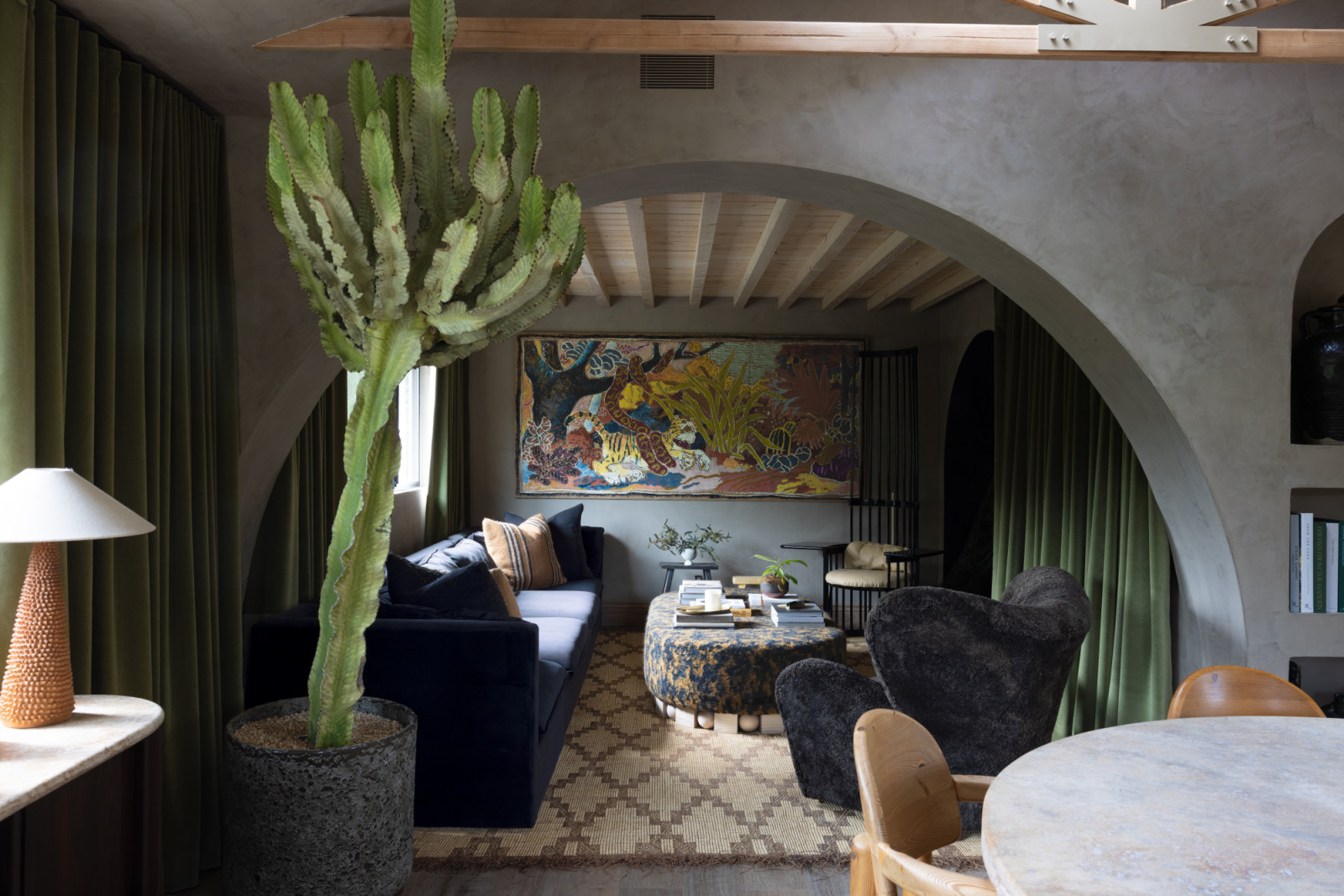 An archway leading to the living room of the Hommeboys Interiors' home in Sonoma, California