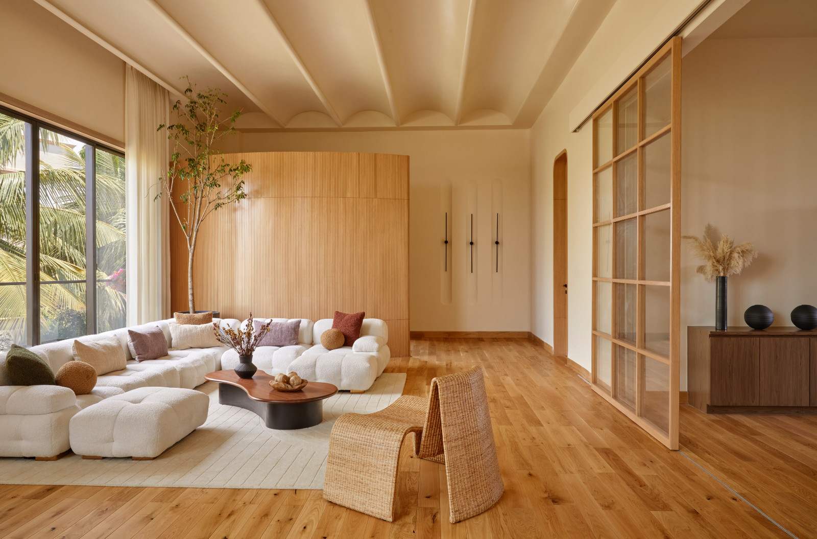 The living room in a distinctive Hyderabad, India family home designed by Studio Nilasha