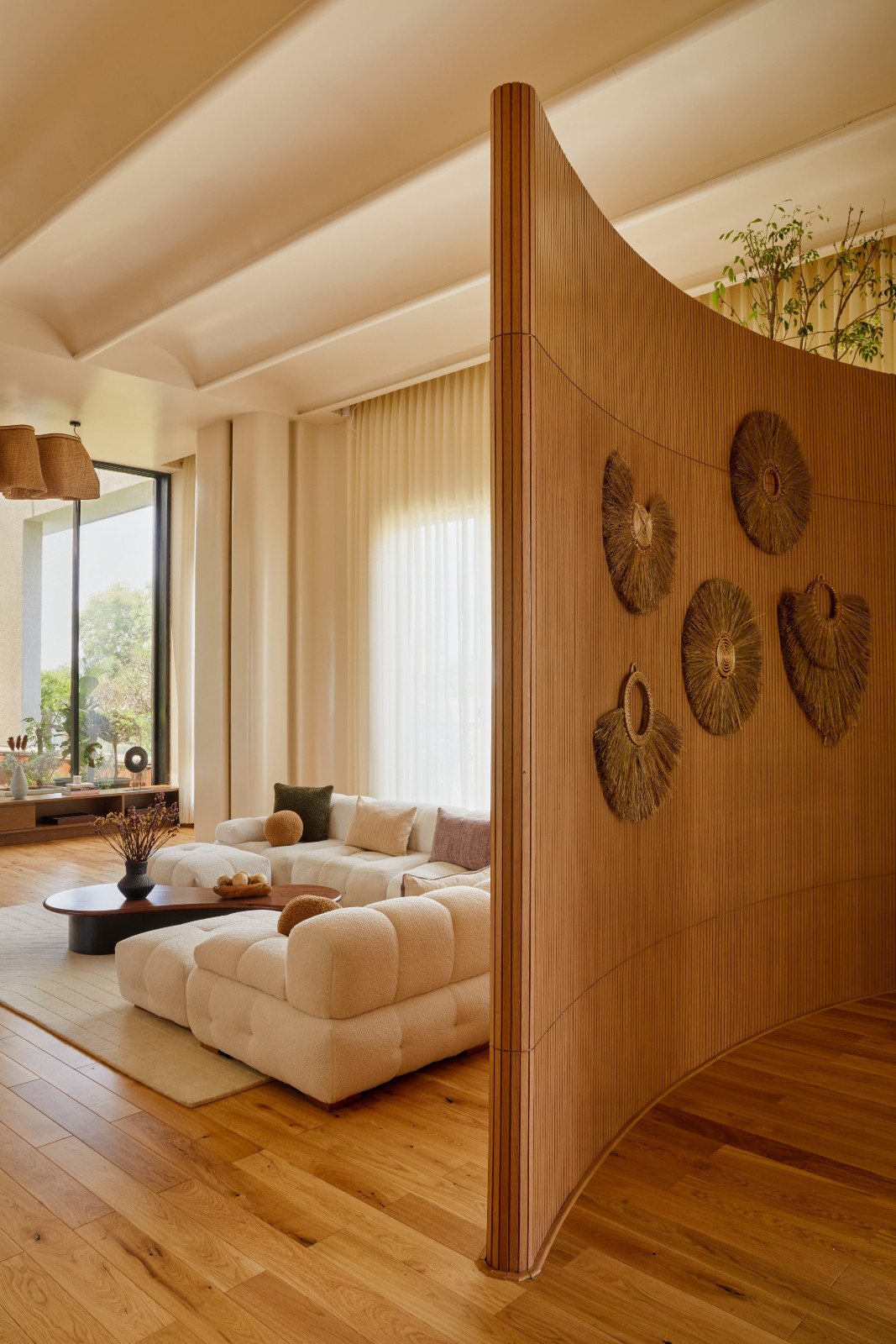 The partition behind the living room in a Hyderabad, India family home designed by Studio Nilasha
