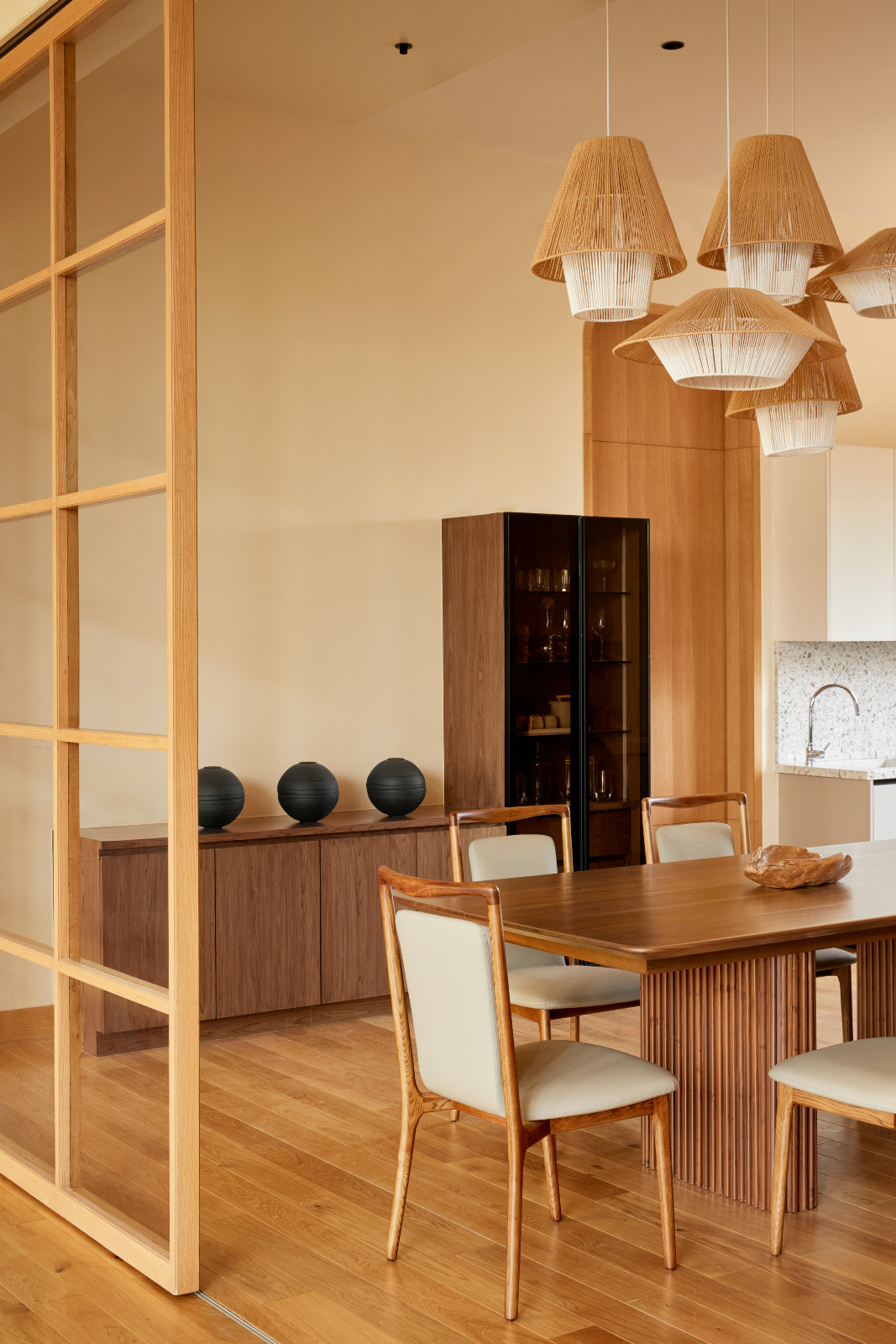 The shoji-inspired partition to the dining room in a Hyderabad, India family home designed by Studio Nilasha
