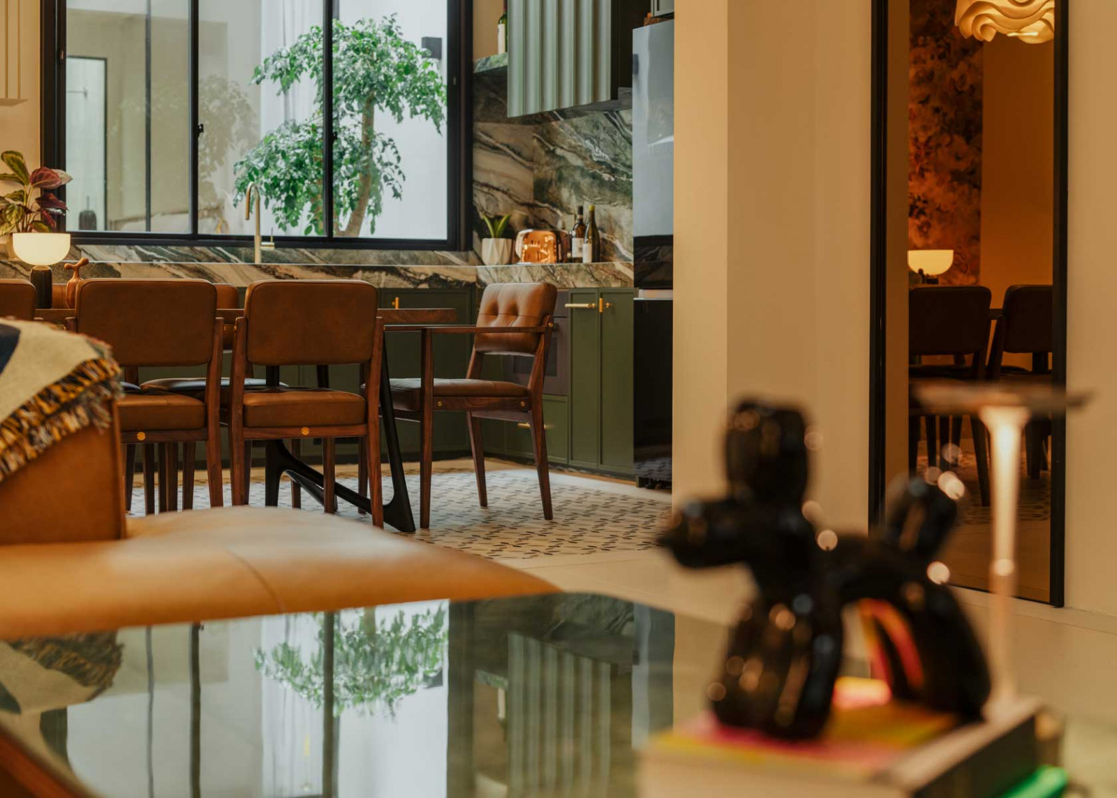 Another view of the dining and kitchen area