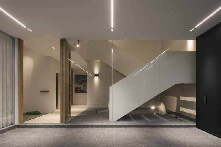 The basement level is organised around a central circulation spine with clear sightlines across spaces