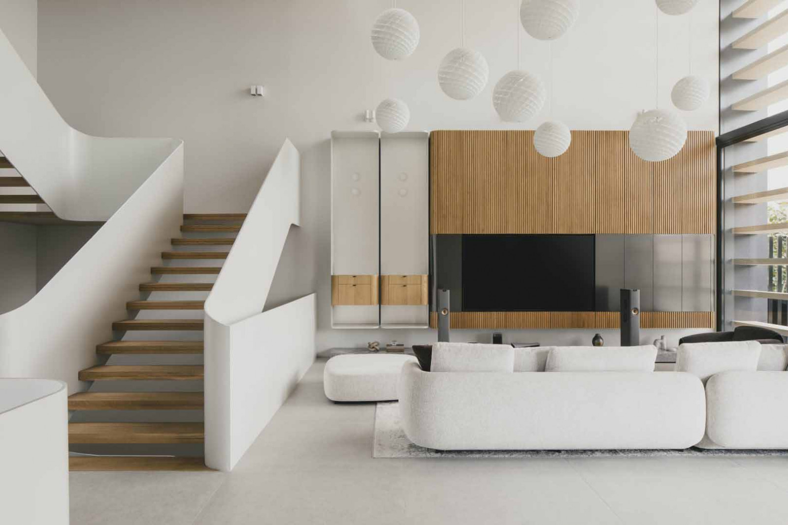 Clustered pendant lamps animate the living space, appearing to float within the double-height volume