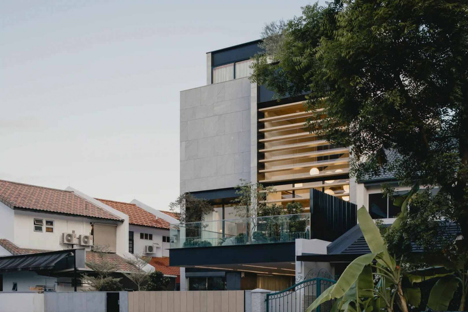 Named the Halcyon House, this semi-detached house in the east is designed as a three-storey home with an attic, maximised within a 15.5m height envelope