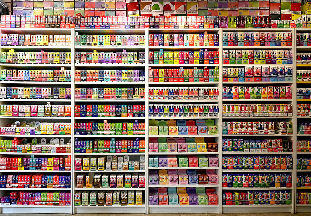 LONDON, ENGLAND - MARCH 23: Shelves of various flavoured disposable vapes and E-liquids are displayed in a vape shop on March 23, 2026 in London, England. (Photo by John Keeble/Getty Images)