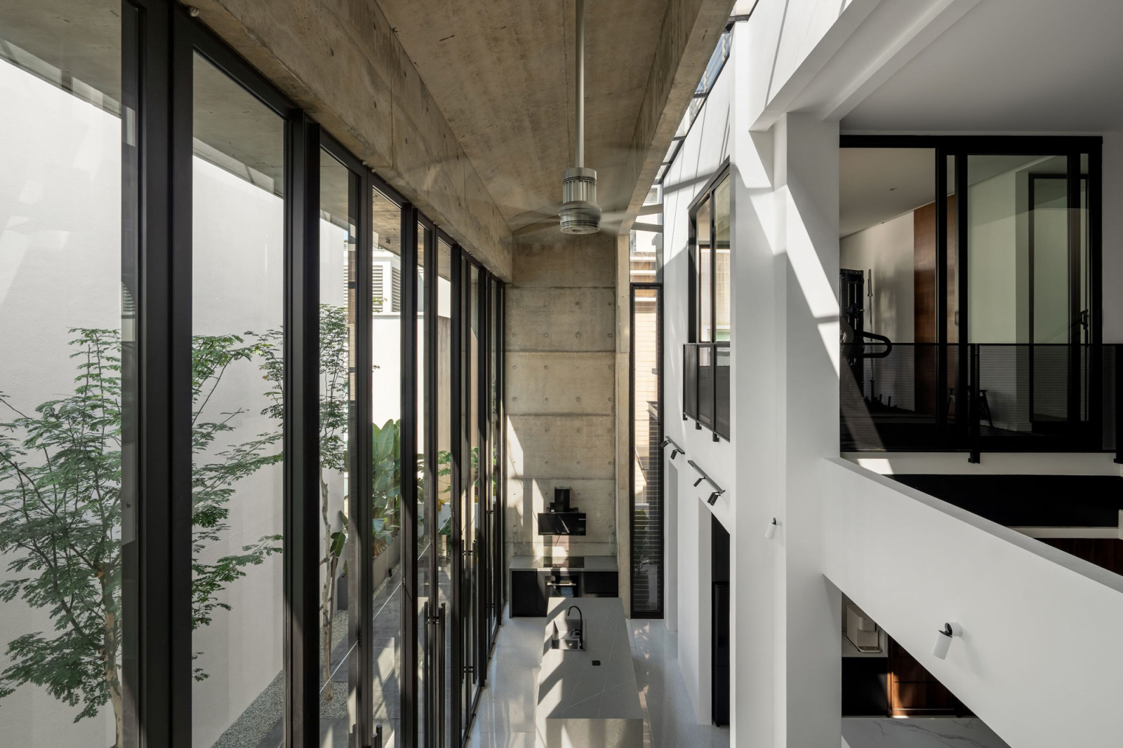 The interior of the new hall from an elevated position, looking along the length of the glazed garden edge