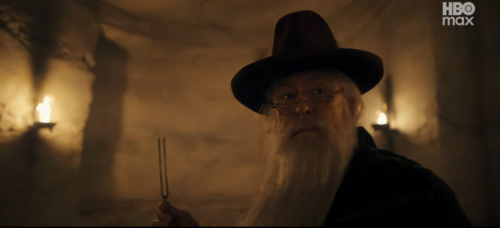 John Lithgow hold up a tuning fork as Albus Dumbledore in the HBO Max ‘Harry Potter’ reboot (Photo: Screncap from YouTube)