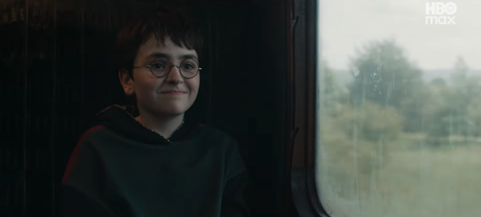 Harry Potter with his trademark glasses, lightning scar and good nature (Screencap from YouTube)
