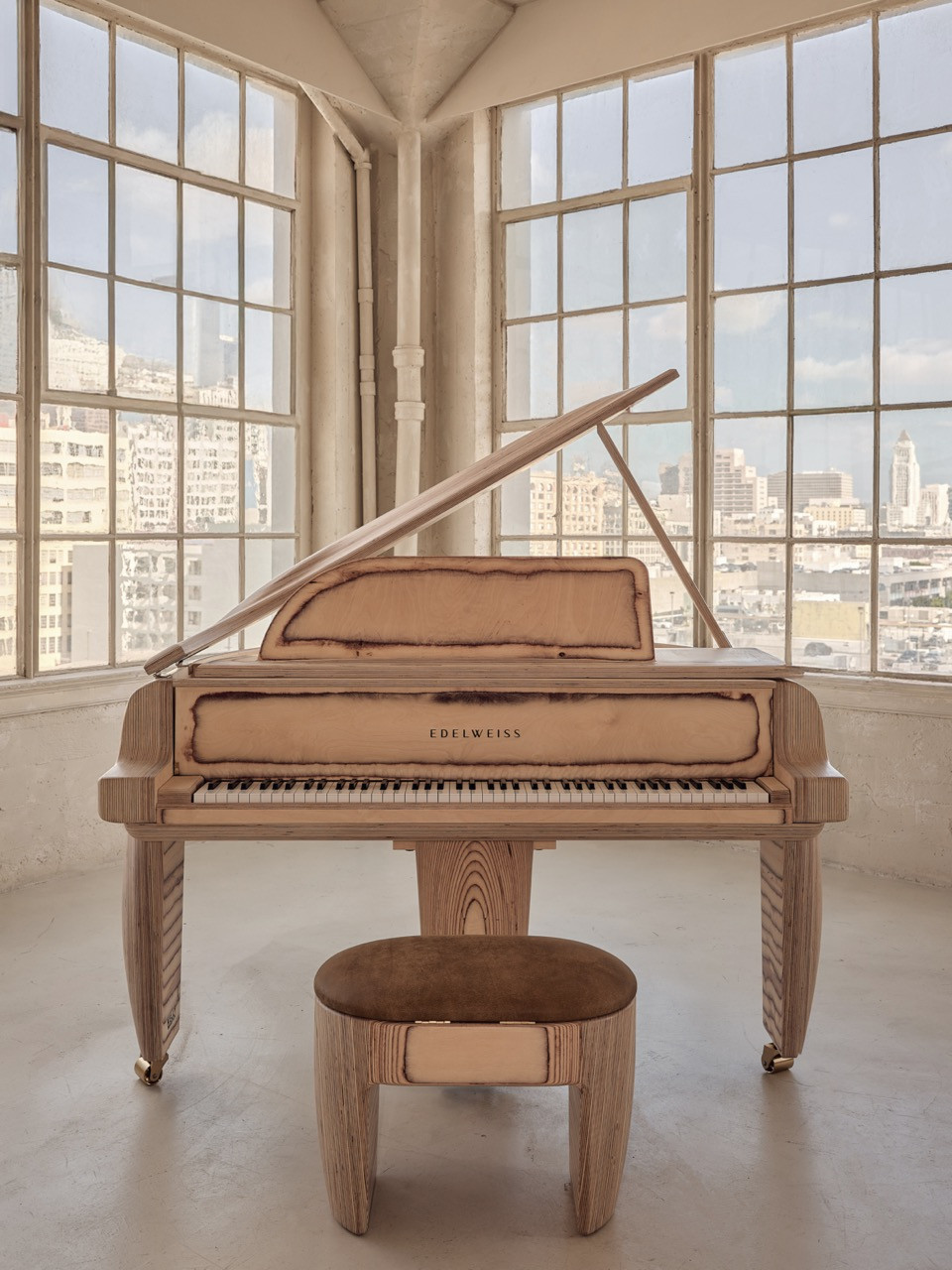 The Timbra piano and stool photographed from the front, Los Angeles