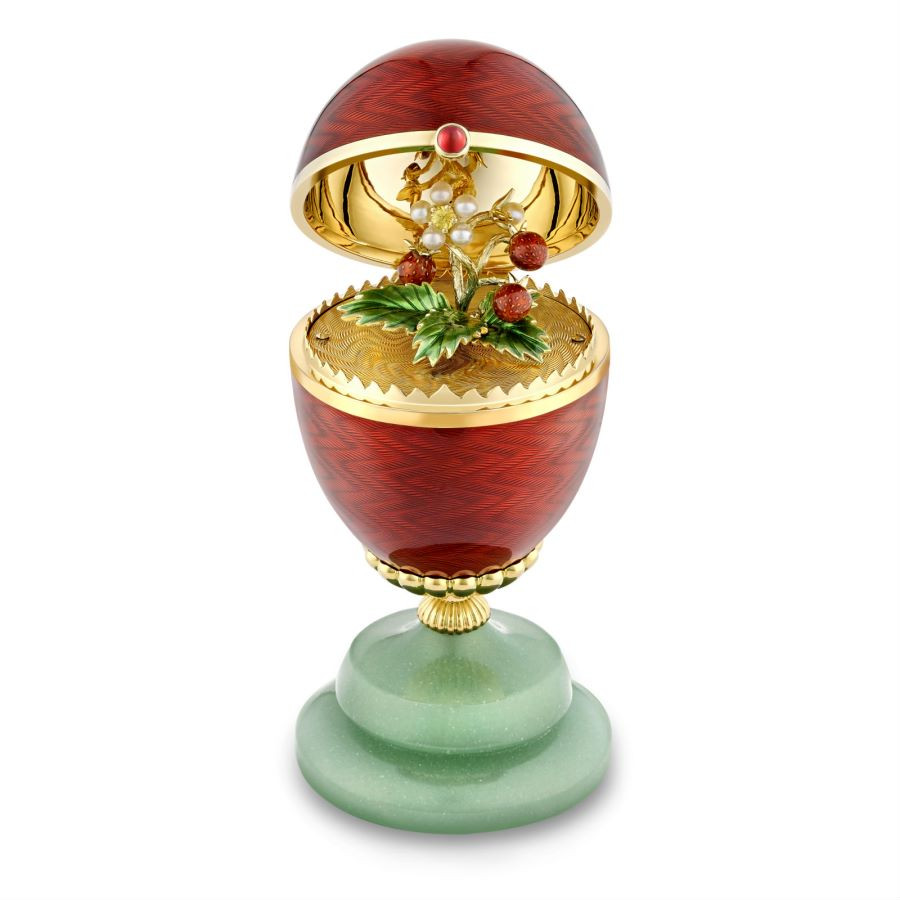 Fabergé 18-karat yellow gold red guilloché enamel egg objet with wild strawberry surprise (Photo: courtesy of Fabergé)