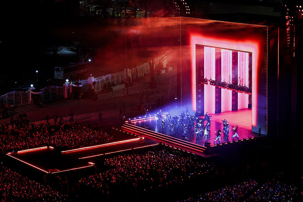 SEOUL, SOUTH KOREA - MARCH 21: (EDITORIAL USE ONLY) K-pop boy band BTS perform onstage during comeback concert at Gwanghwamun Square on March 21, 2026 in Seoul, South Korea. The free concert is the band's first performance in nearly four years. (Photo by Kim Hong-Ji - Pool/Getty Images)