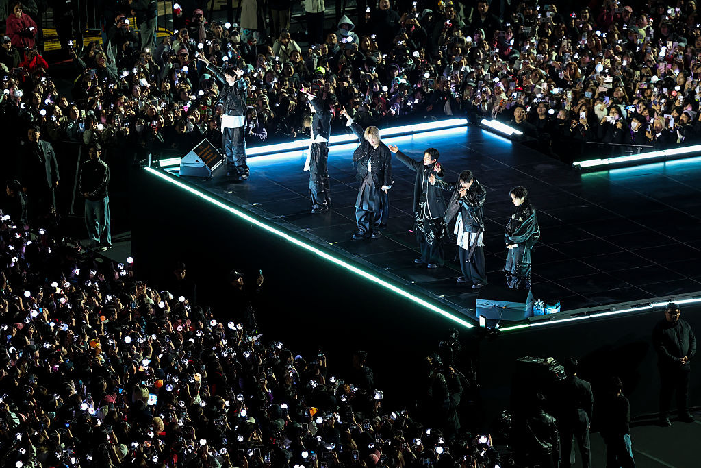 SEOUL, SOUTH KOREA - MARCH 21: (EDITORIAL USE ONLY) K-pop boy band BTS perform onstage during comeback concert at Gwanghwamun Square on March 21, 2026 in Seoul, South Korea. The free concert is the band's first performance in nearly four years. (Photo by Kim Hong-Ji - Pool/Getty Images)
