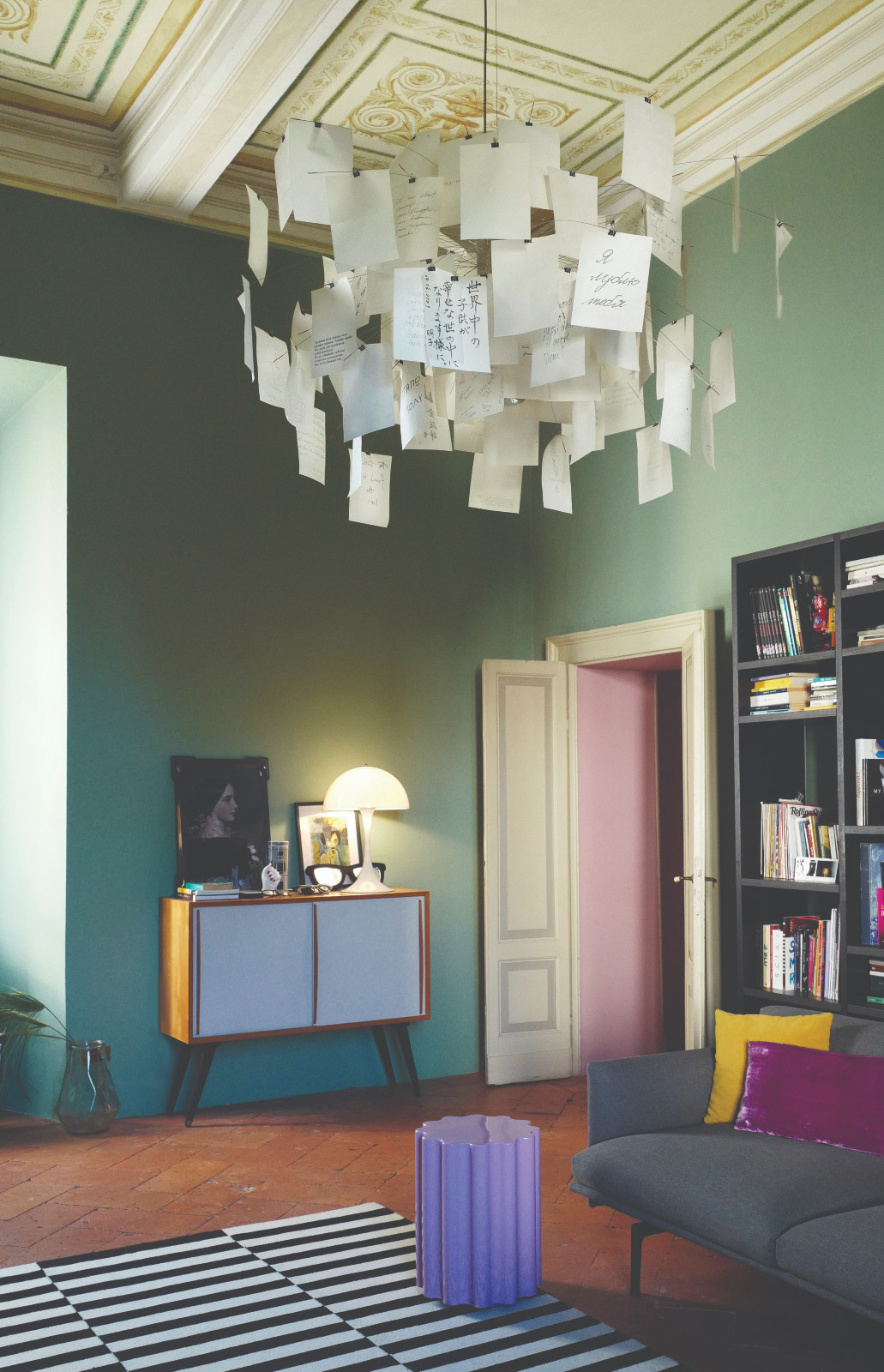 The vibrant green TV room feels both vividly alive and unexpectedly comforting. (Photo: Mariana Ugarte)