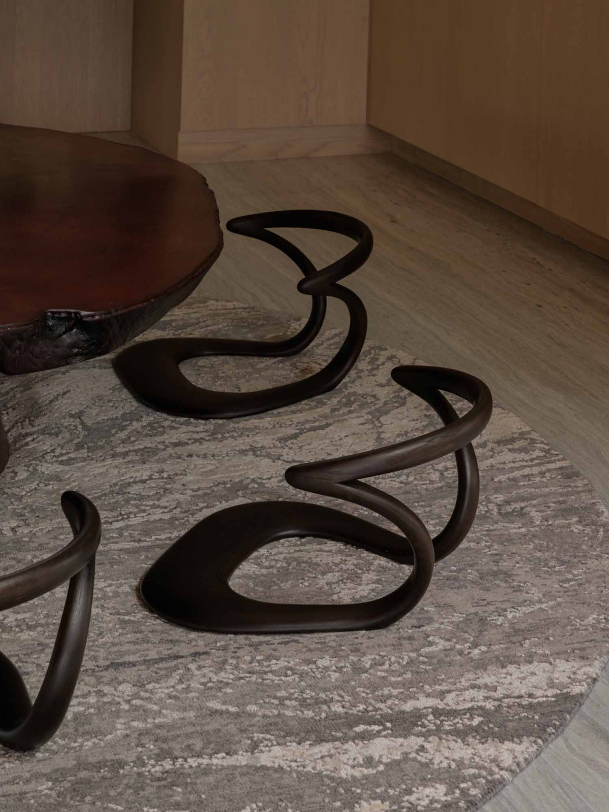 This dining room features a live-edge coffee table and Tatamiza floor seats by Hida Sangyo from the owner’s collection