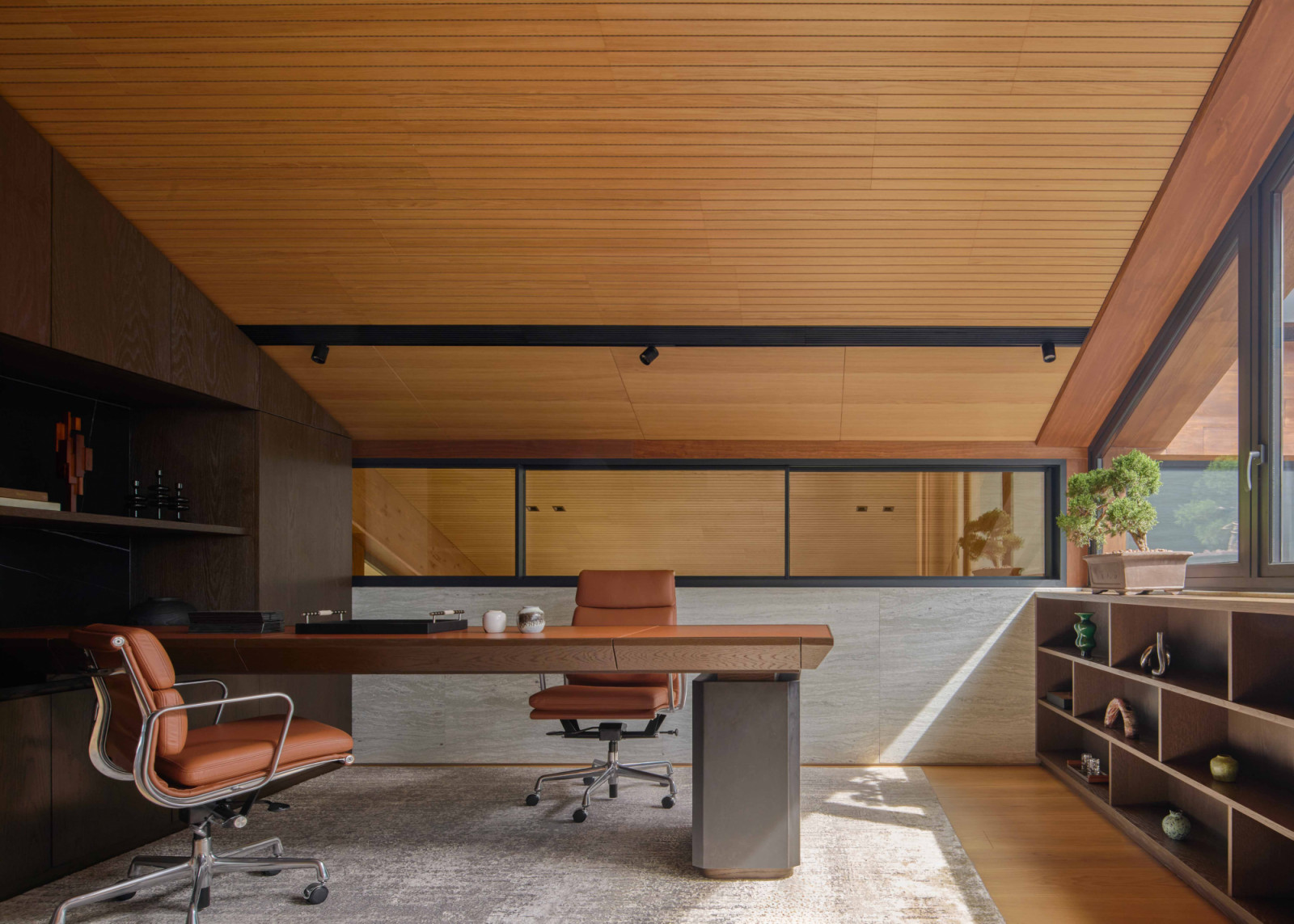 The attic level houses a private study with views of both indoors and out