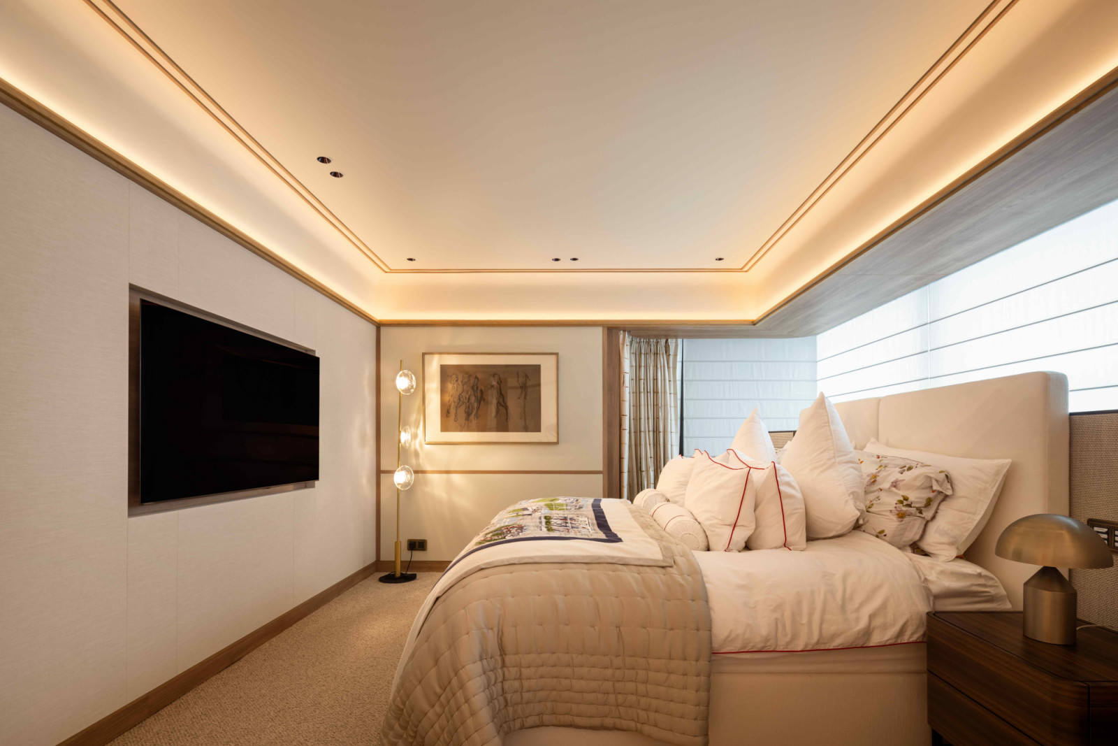 The minimalist master suite layered with rich materials