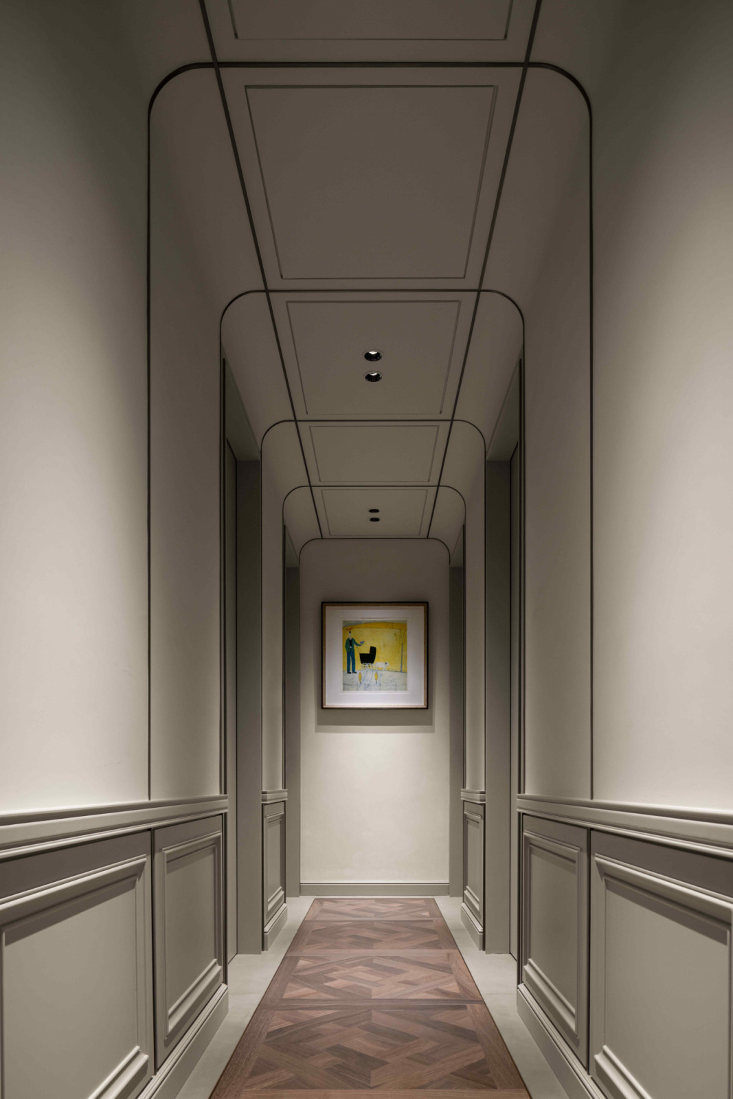 Hallways with curved ceilings and parquet wood flooring